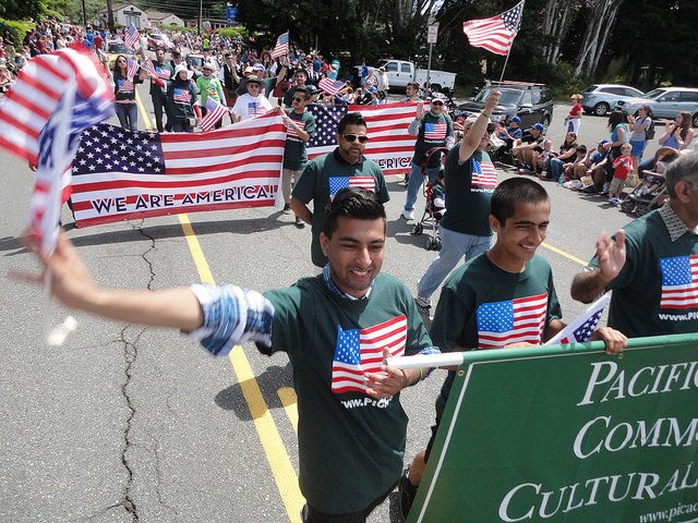 Members of the Pacific Islamic Community and Cultural Services group march in the 2014 Freedom Festival parade in Bothell.