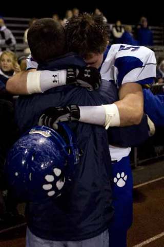 A friend consoles Bothell High’s Eric Philips