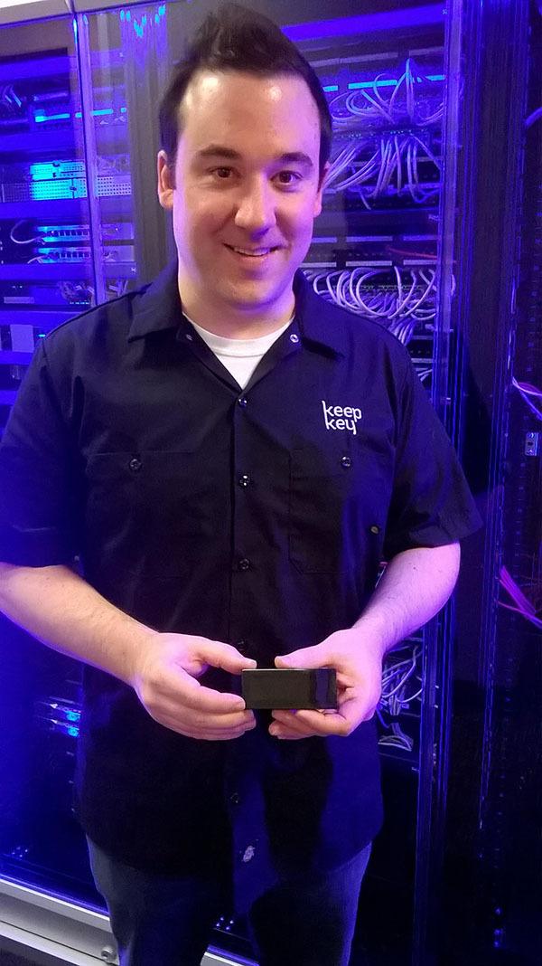 Owner and designer Darin Stanchfield shows off a KeepKey