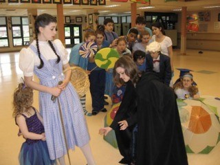 Avalyn Schulz as Dorothy and Kaitlyn Corwin as the Wicked Witch for Northshore Networks Youth Theater.