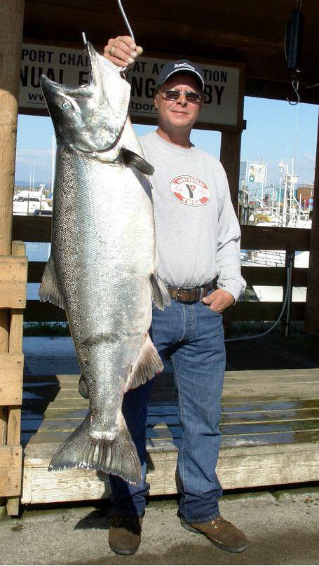 Bothell's Ray Jennings proudly displays a whopper of a catch - a 36 pound