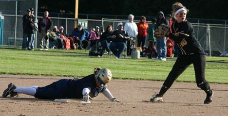 Inglemoor High's Kaylee Hardin looks toward home after forcing out a Kelso High runner at second base.