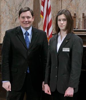 State Rep. Derek Stanford (D-Bothell) visits with Cedar Park Christian School freshman Hope Lackey on the floor of the House of Representatives