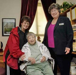 Northshore Adult Day Health Center regular 106-year-old Marianne Jones (center) and her daughter