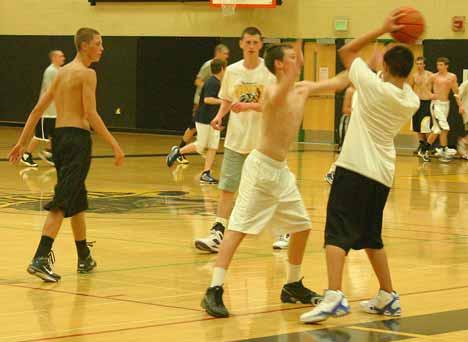 Youngsters play a pickup basketball game at last week's Inglemoor boys camp.