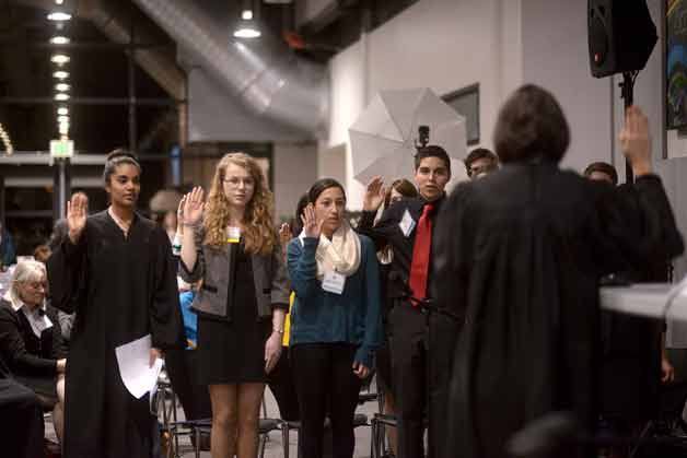 Students take an oath during the Bothell Youth Court held at the University of Washington Bothell on Jan. 28.