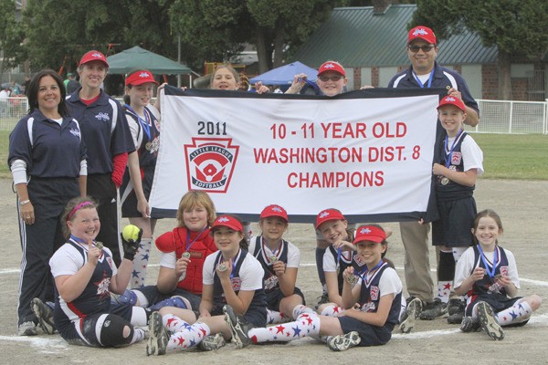 The Northshore Little League fastpitch All-Star team beat North King County 31-5 on July 8 to win the District 8 title. Pictured top row