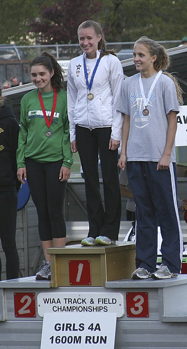 Tansey Lystad (center) edged out Woodinville’s Chandler Olson (left) and Mount Rainier’s Jordan McPhee (right) in the 1