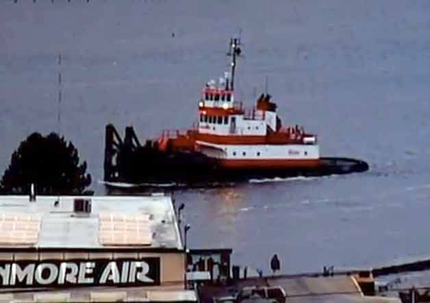 This screen shot was taken from the 'crazyhazedaze' youtube video. The video was posted by Kenmore resident Janet Hays. It allegedly shows a Kiewit/General/Manson tugboat passing by Kenmore Air on Dec. 18.