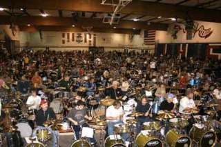 Hundreds of drummers hammer away on their kits at Woodstick.