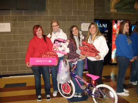 Students from Joe Baillargeon's class donate their items to the Bothell High associated student body gift drive Dec. 15.