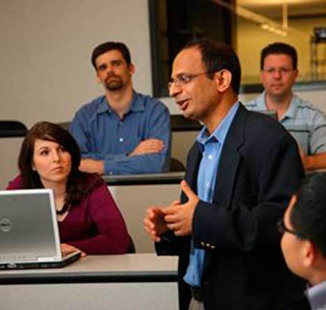 UW-Bothell Director of Business Programs Sandeep Krishnamurthy addresses some of his program’s students.