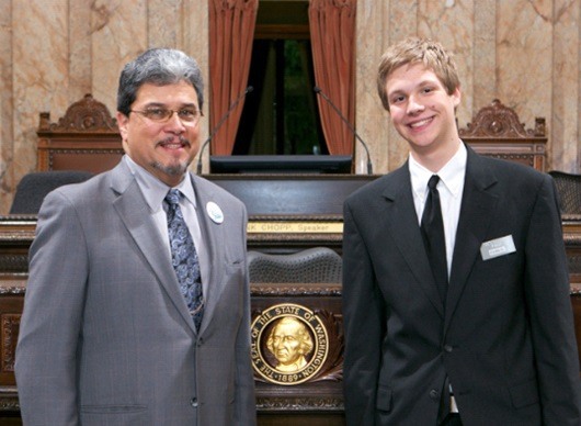 State Representative Luis Moscoso (D-Mountlake Terrace) with homeschooled student and Bothell resident Evan Olson on the floor of the House of Representatives.