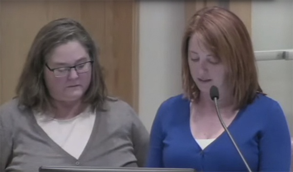 Tammy Urquhart (left) and her neighbor (right) present their concerns to the Bothell City Council at a Dec. 15 meeting.