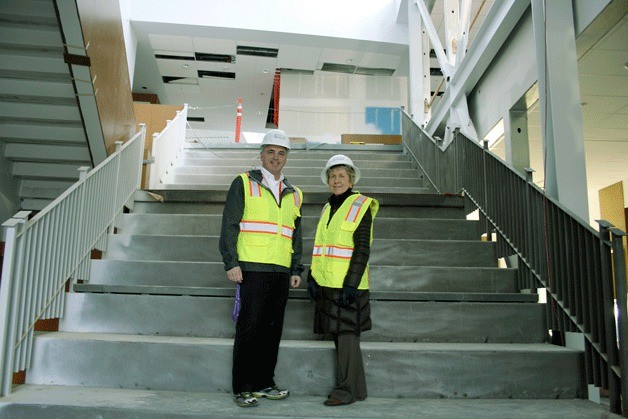 North Creek Planning Principal Eric McDowell and Northshore School District Deputy Superintendent Carolyn O’Keeffe stand in Building One of the new North Creek High School in north Bothell.