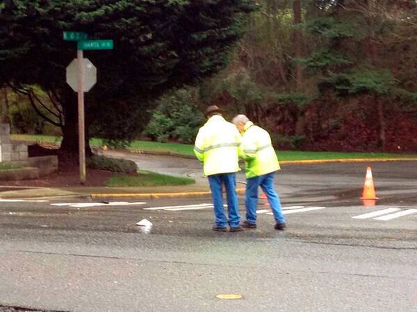 King County Sheriff investigators search the 15900 block of Northeast Juanita Drive for evidence after a woman in her 20s was struck and killed by a Kirkland man early Friday morning.