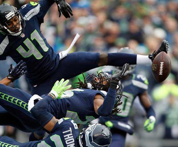 Seattle defenders Byron Maxwell (41)