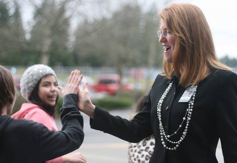 Skyview Junior High Principal Dawn Mark greets students at the Rachel's Challenge presentation this morning. Rachel Scott was the first person killed at Columbine High School on April 20
