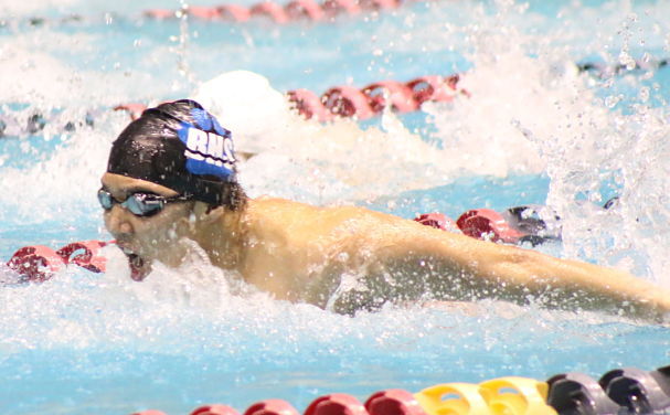 Bothell High School student Andrew Oh competes during his state title race in the 100 butterfly on Saturday at the King County Aquatic Center in Federal Way.