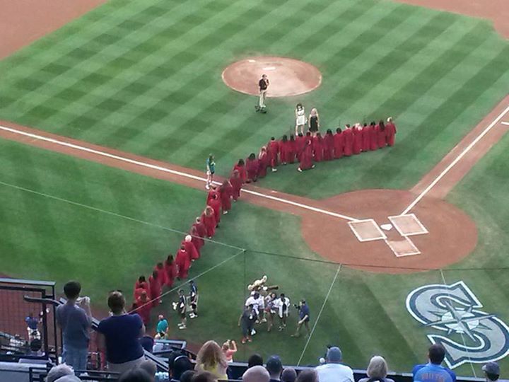 Skyview Junior High School's Choir takes to the field at Sunday's Mariner's game in Seattle.