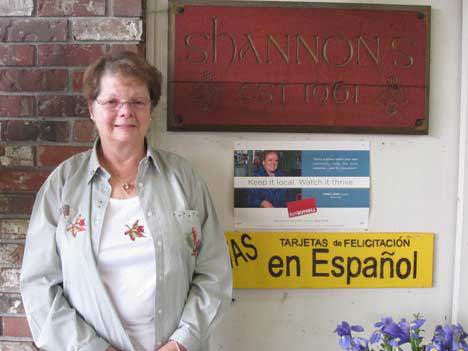 Peg Dowd stands outside of her Shannon’s Flowers and Gifts shop on Bothell’s Main Street. She recently closed the family’s 50-year-old business and retired.