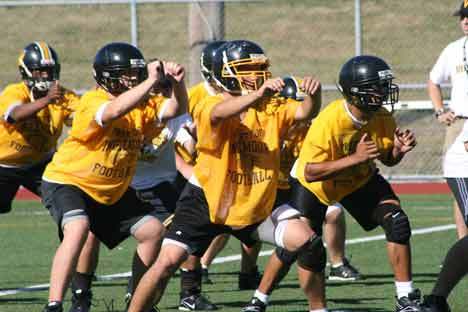 Inglemoor High linemen run through a drill Aug. 19 during the first day of practice. Look for a story later this week.