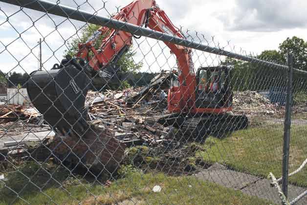 Buildings are demolished in downtown Bothell to make way for a potentially new City Hall facility. The City Council will hear public comment on Tuesday about the proposed project.
