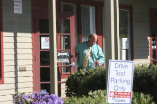 Dick Balnicky of Tulalip exits the Washington State Department of Licensing office at Bothell Landing last Thursday afternoon. The office is slated to close in the fall. ANDY NYSTROM