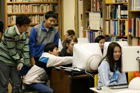 Scenes like this one last year in a library  at Kenmore Junior High should become common again as a new school year gets under way.