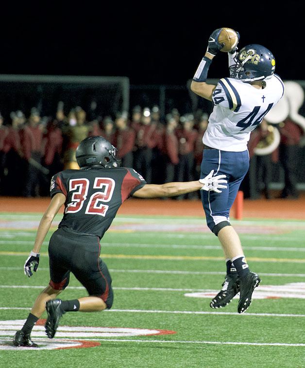 Cedar Park Christian wide receiver  Carson Pettett catches a six-yard pass from Jaden Sheffey over a Cedarcrest defender on Friday.