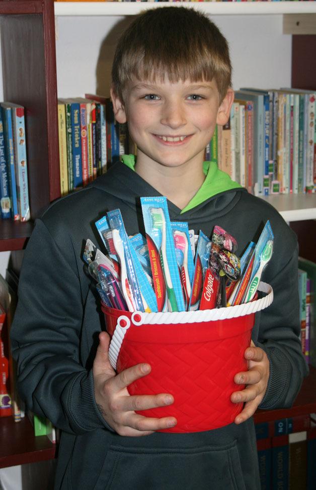 Cedar Park Christian School fourth-grader Ty Morris collected more than 3