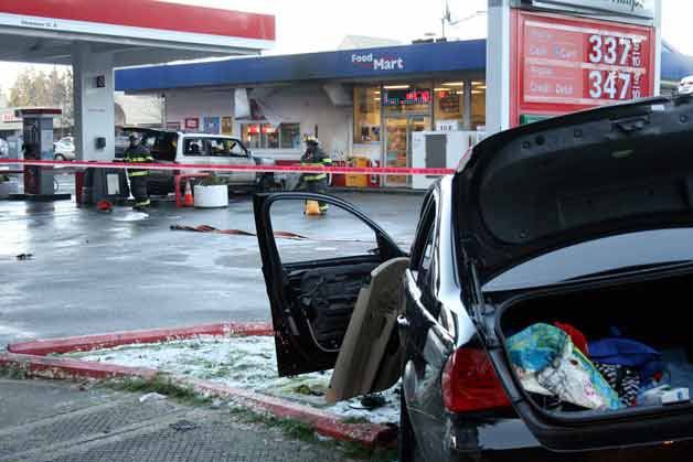 A vehicle crashed into gas pumps at the 76 gas station and ignited into flames after it collided with another vehicle on Kirkland’s Finn Hill