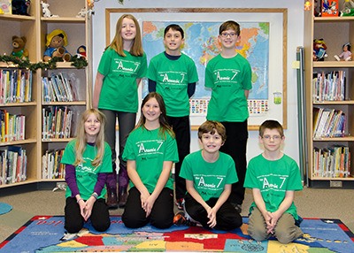 Members of the Atomic 7 FLL robotics team from left in back