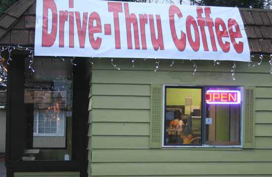 Mo Calhoun serves coffee at The Paradise Espresso stand this morning on Bothell-Everett Highway.