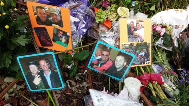 This memorial for Redmond High School graduate and Kenmore resident Kyle J. Reel was created at the site of a car crash that took his life in Kirkland. The memorial has since been removed.