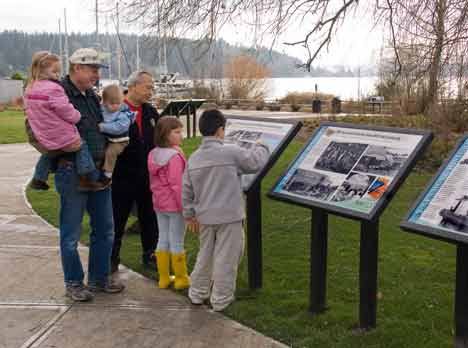 A group of local residents enjoys the Kenmore History Path last summer.