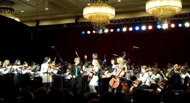 Anger and the Furies and the Wintergrass Youth Orchestra perform Emy Phelp’s original song Down in the Hollow.