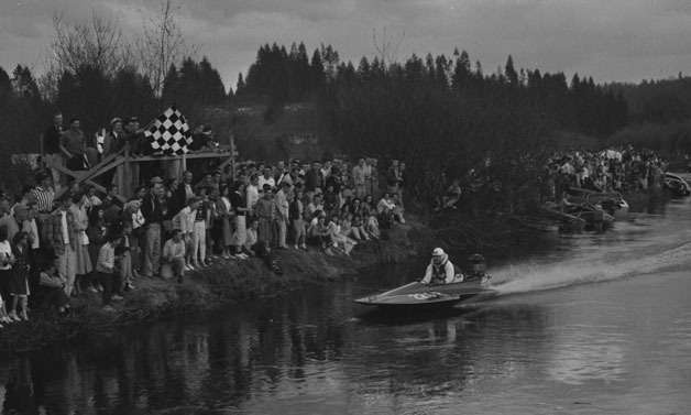 A man competes in the Kenmore Hydroplane Cup back when it was an annual event.