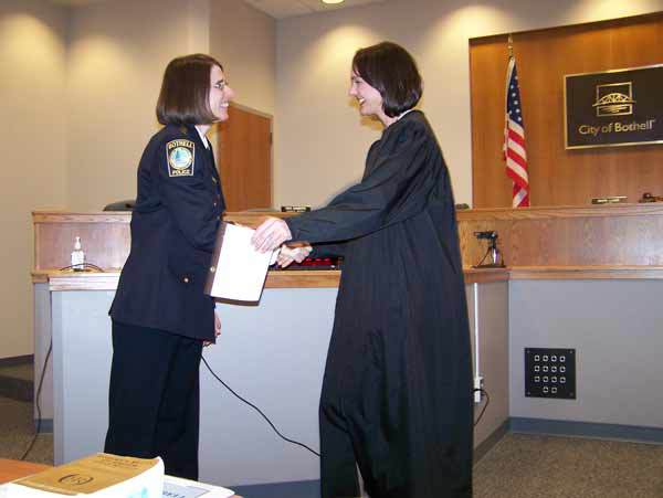 Judge Michelle Gehlsen swears in new Bothell Police Chief Carol Cummings Tuesday evening at Bothell Municipal Court. Cummings replaces longtime chief Forrest Conover.