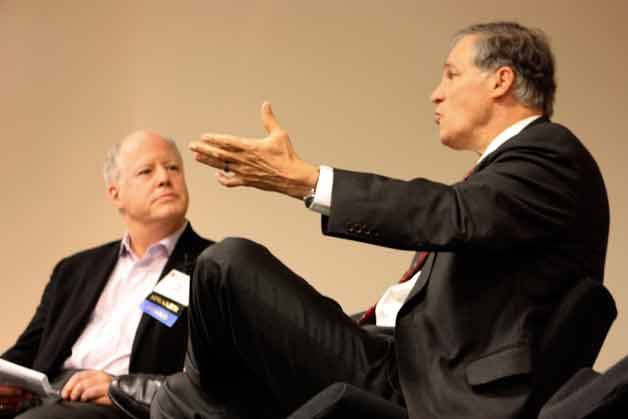 McKinstry CEO Dean Allen speaks with Gov. Jay Inslee on stage during the STEM Summit held at Microsoft in Redmond.