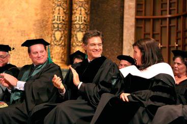 Dr. Mehmet Oz claps for his wife