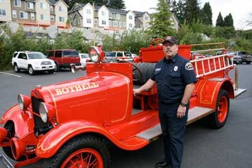 Bothell Fire Department Lt. Randy Parkhurst displays the city’s 1929 Ford Model A fire truck.