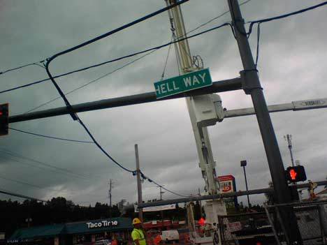 As workers took apart and moved signage on Bothell Way and 68th Avenue Northeast in Kenmore Monday evening