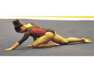 Inglemoor High’s Madison Podlucky runs through her floor exercise during the level-10 state championships. She took first all around. COURTESY PHOTO