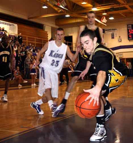 Inglemoor High’s Jerry Molina attempts to save the ball from going out of bounds during Friday’s game at Lake Washington.