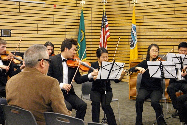 Students of the Inglemoor High School Chamber Orchestra perform for Kenmore Citizens at City Hall. Later this year