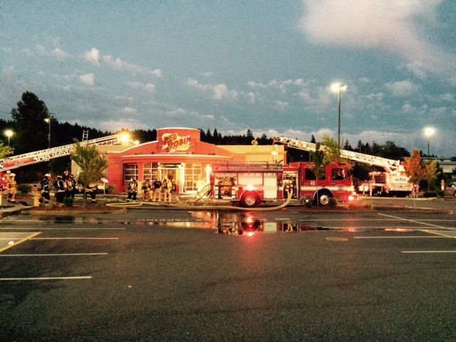 14 rigs from six fire districts battled the blaze at the Red Robin along Bothell-Everett Highway on Sunday night.