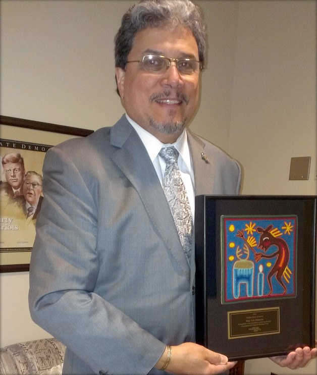 Rep. Luis Moscoso was presented with the Golden Door Award  for his commitment to promoting the rights of immigrants and refugees in Washington state.