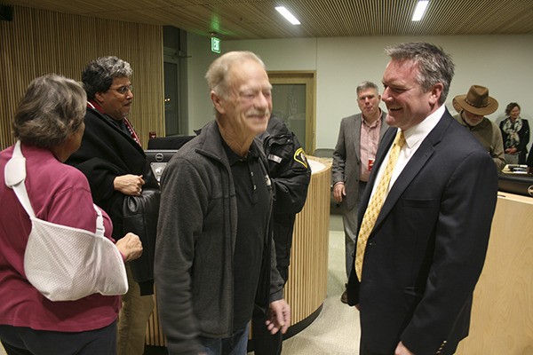 Mayor Rheaume talks with residents after being voted in as Bothell's new mayor at the Jan. 5 City Council meeting.