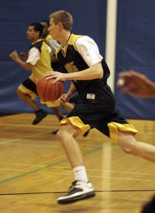 Inglemoor High’s Todd Campbell dribbles up court during practice last week.